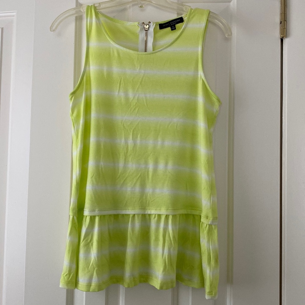 Green Envelope light and comfy top. Stylish peplum flared bottom NWOtags. 26”L